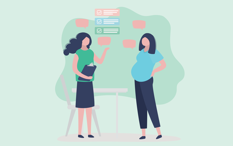 Woman discussing pregnancy with healthcare. CREDIT_shutterstock_2479129395