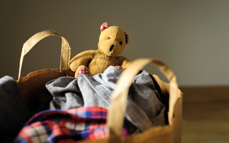 teddybear clothes in a bag_CREDIT_alamy