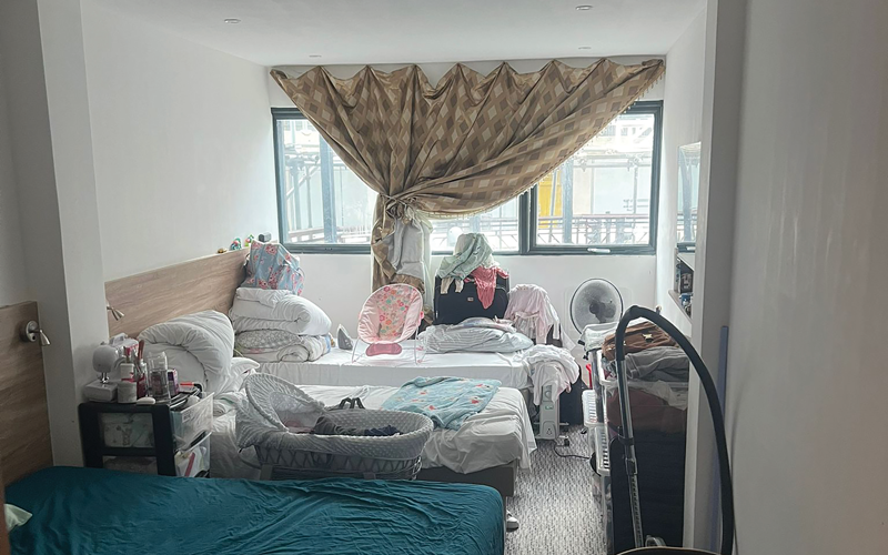 mother in bedroom with window - Supplied